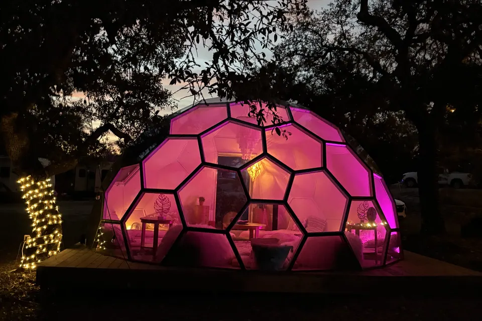 The dome lit from within at dusk