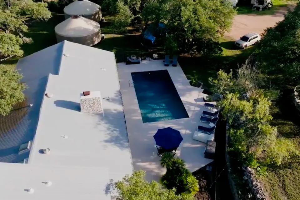 The Retreat House and its pool seen from above