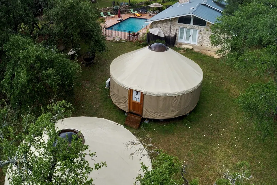 The two yurts among the trees, seen from above